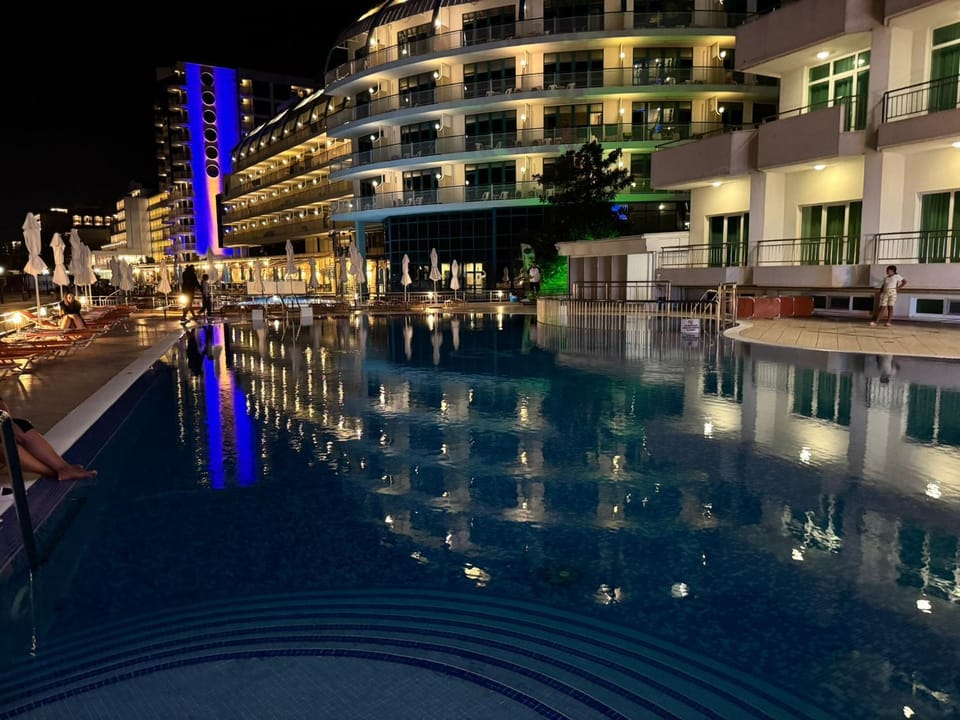 Property building, Night, Swimming pool