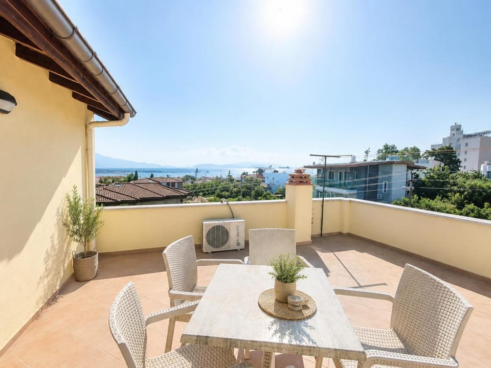 Property building, Patio, Day, Natural landscape, View (from property/room), Balcony/Terrace, Living room, Seating area, Dining area, Evening entertainment, Sea view