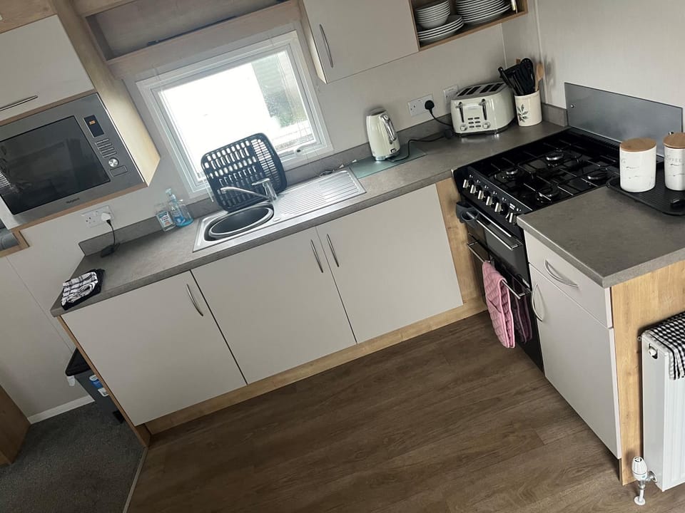 Kitchen or kitchenette, stove, toaster