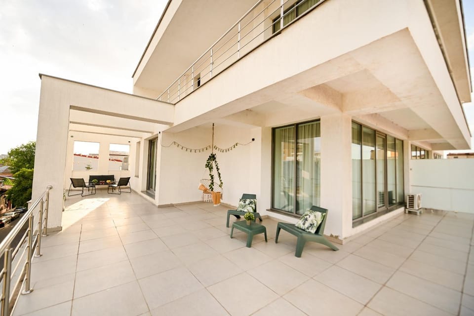 Property building, Patio, Day, View (from property/room), Balcony/Terrace, Living room, Seating area, Dining area