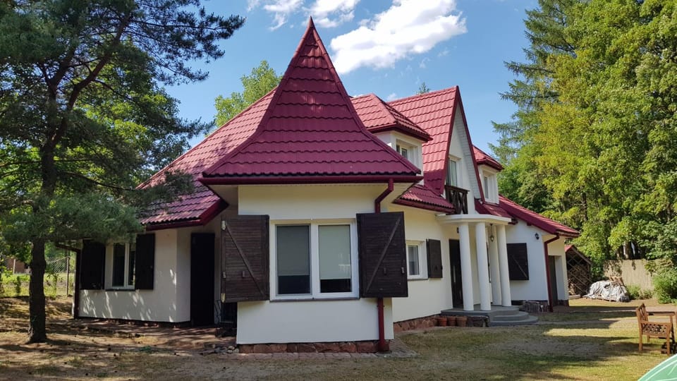 Projekt Pluski Komfortowy Dom dla 10 osób nad jeziorem House in Poland