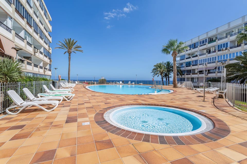 Property building, Living room, Swimming pool