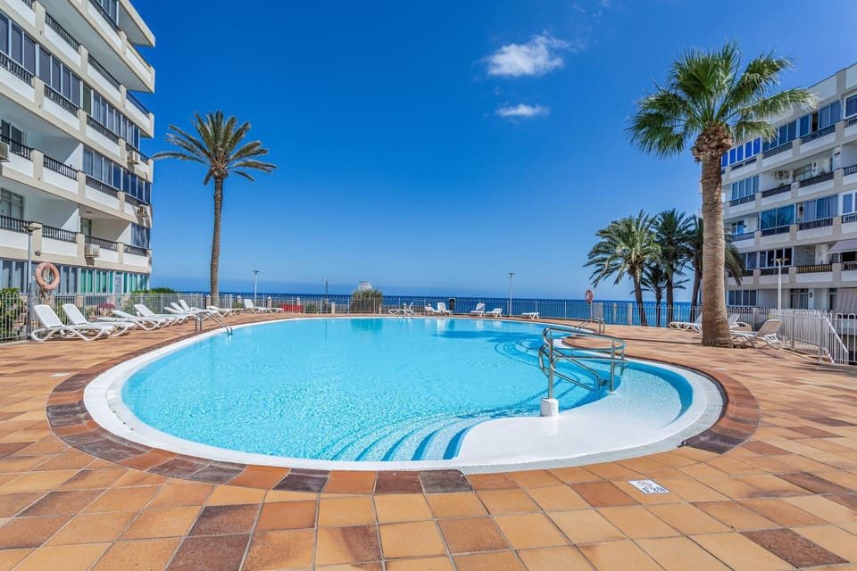 Property building, Living room, Swimming pool