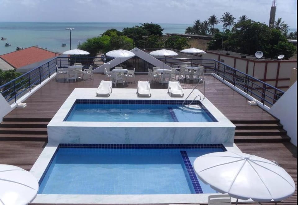 View (from property/room), Pool view, Sea view, Swimming pool