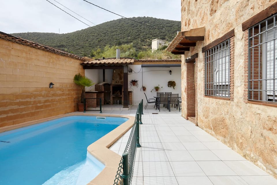 Property building, Living room, Swimming pool