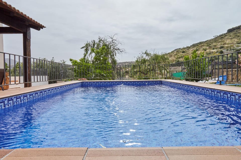 Property building, Living room, Swimming pool