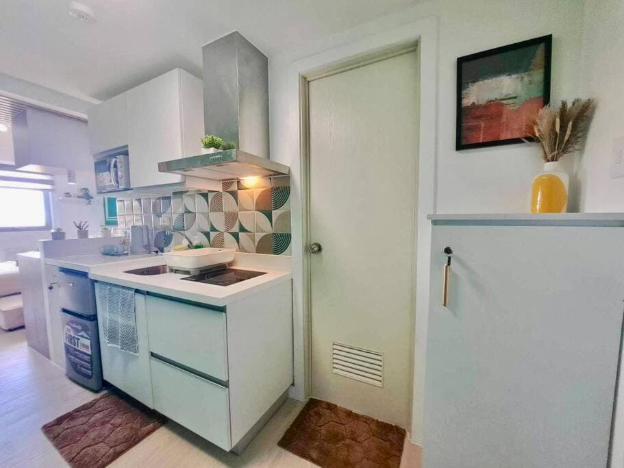 Casa Verde Studio at Azure North by THE BALI CORNER AT AZURE NORTH, Stylish, Spacious Balcony with Beautiful View of Mt Arayat Apartment in Calabarzon