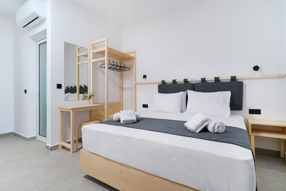 Bed, Bedroom, towels, wardrobe, air conditioner