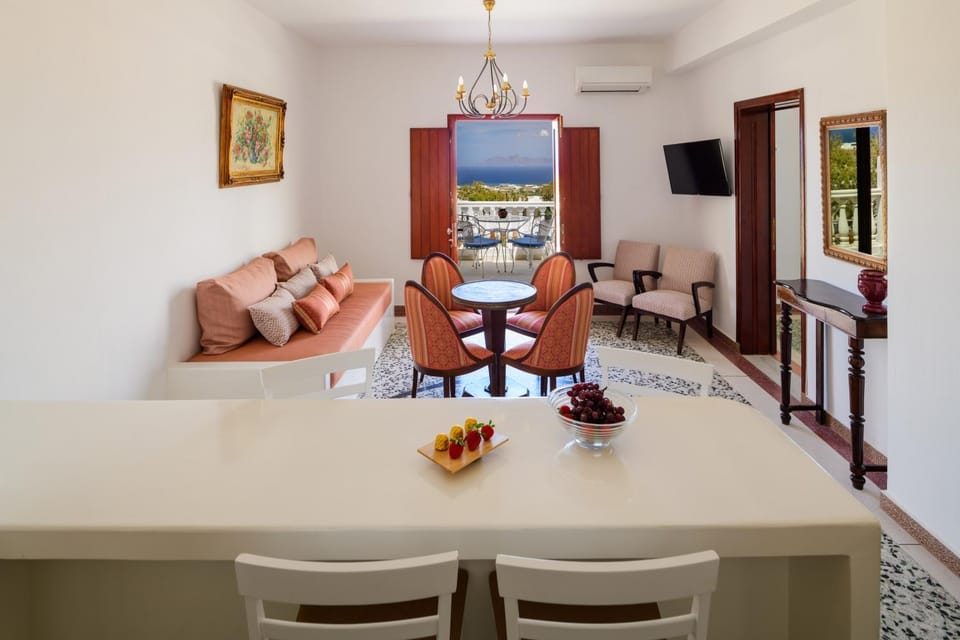 Property building, Living room, Seating area, Dining area