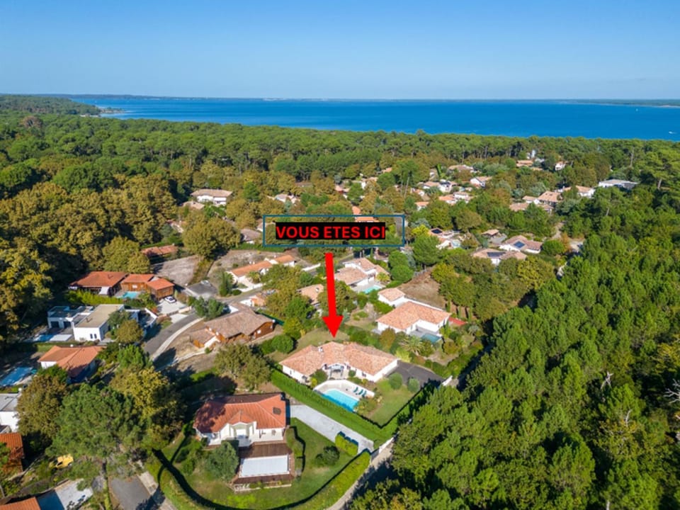 Villa familiale avec piscine chauffée, clim, 4 chambres, proche golf et plages - FR-1-319-565 Villa in Biscarrosse