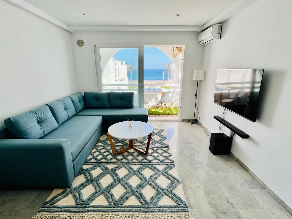 TV and multimedia, Living room, Seating area, Sea view, air conditioner