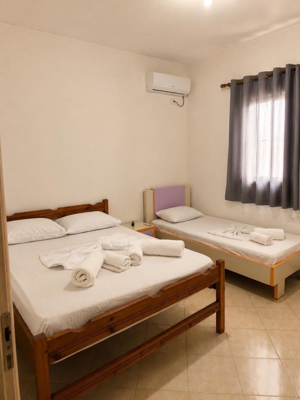 Bed, Photo of the whole room, Bedroom, towels, air conditioner