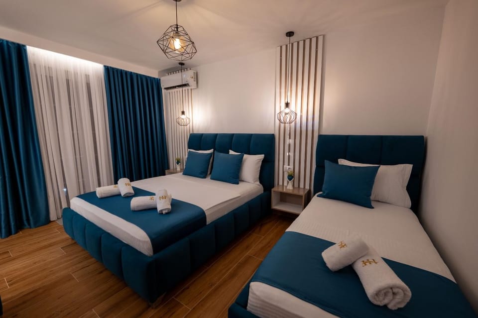 Photo of the whole room, Bedroom, towels, air conditioner