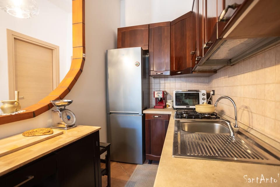 Kitchen or kitchenette, oven, stove