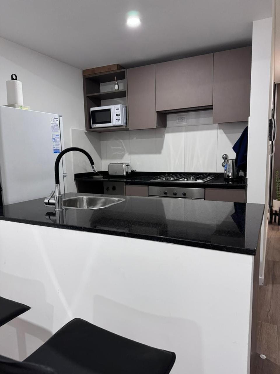 Kitchen or kitchenette, oven