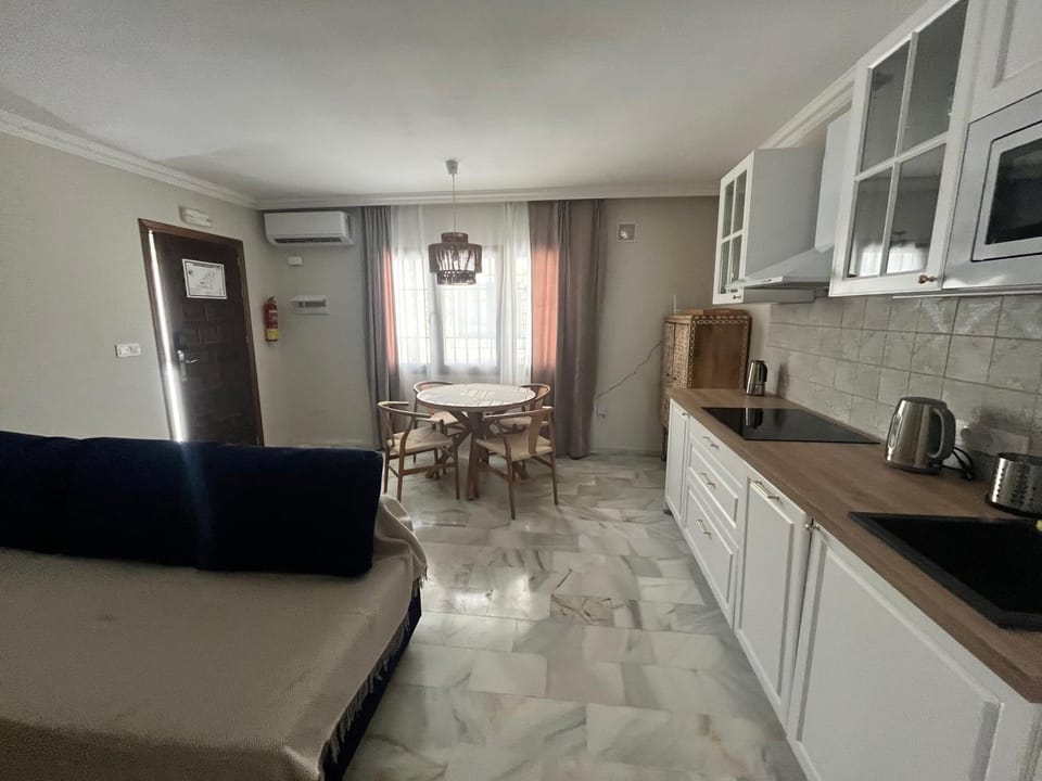 Kitchen or kitchenette, Living room, Seating area, Dining area, dishwasher, oven, stove