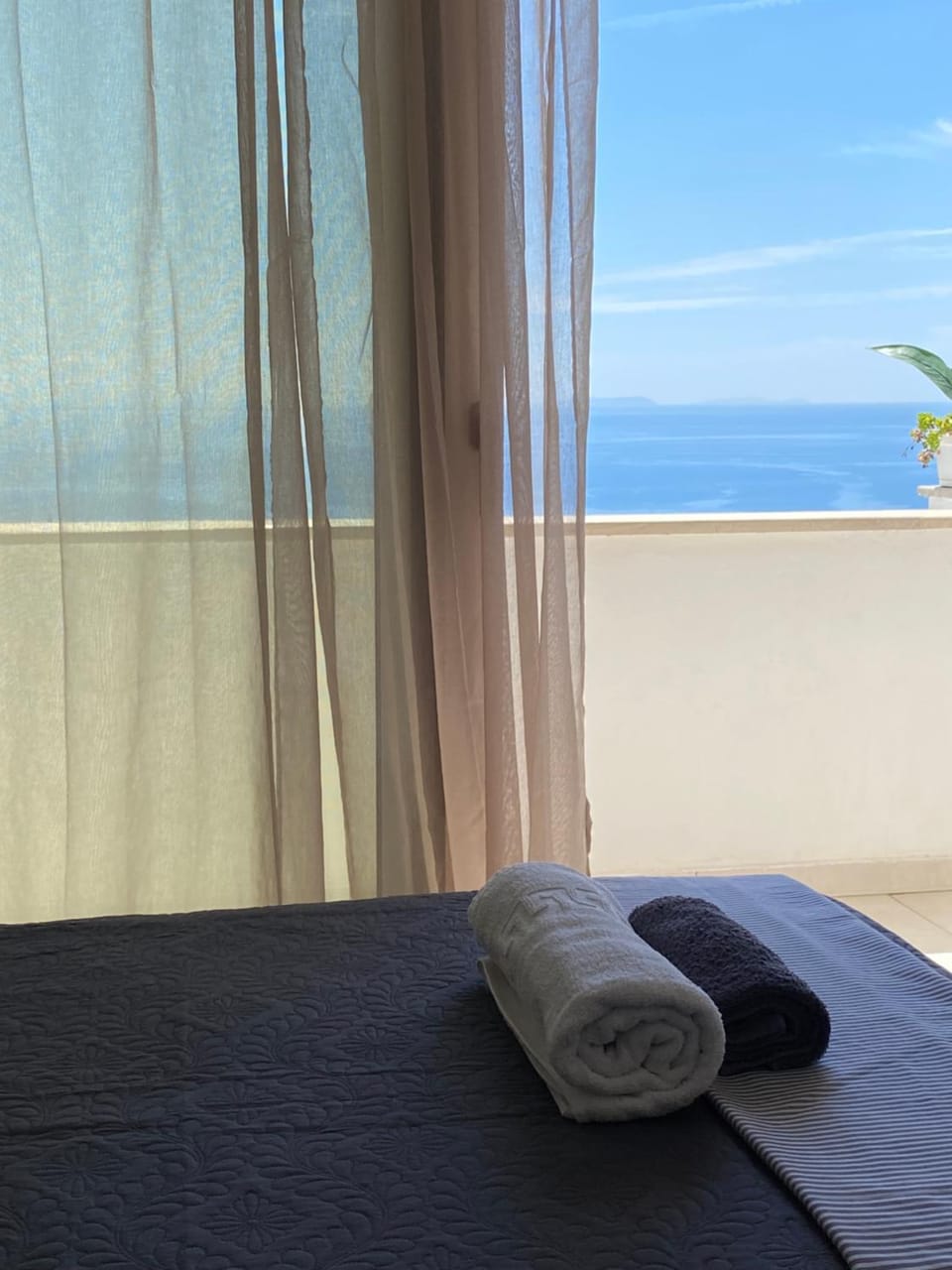Bed, Natural landscape, Bedroom, Sea view, towels