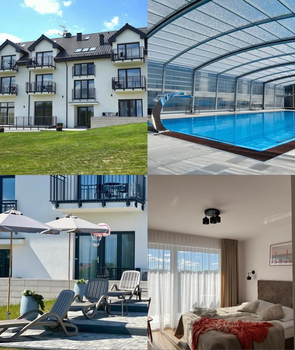 Property building, Patio, Pool view, Swimming pool, sunbed
