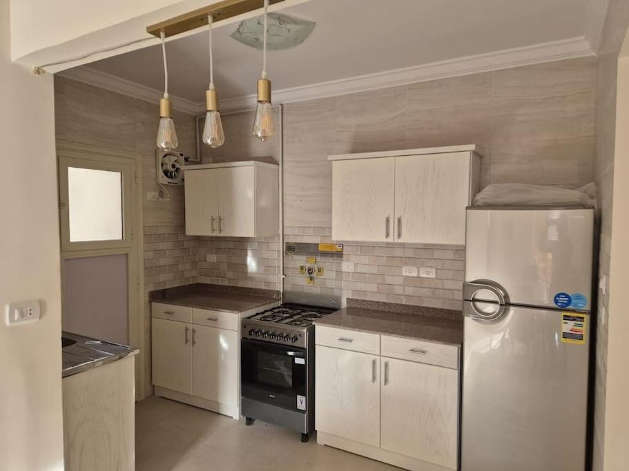 Kitchen or kitchenette, oven, stove