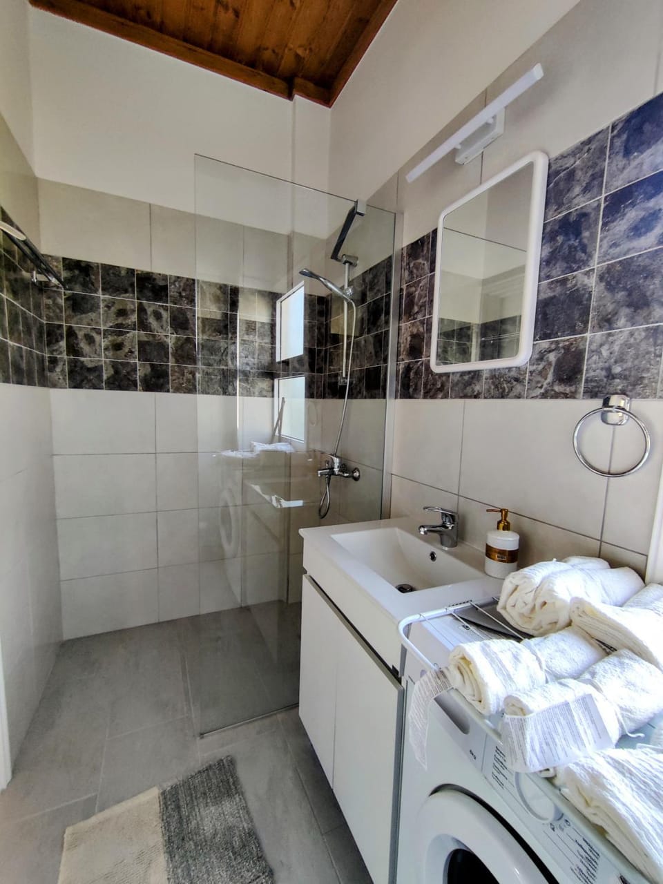 Bathroom, towels, washing machine, dryer