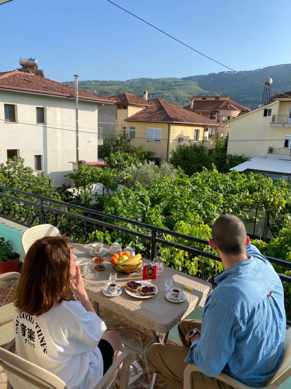 Property building, Patio, Spring, Day, People, Natural landscape, View (from property/room), Balcony/Terrace, Food and drinks, Dining area, Food, Guests, Mountain view, Drinks, Alcoholic drinks, group of guests