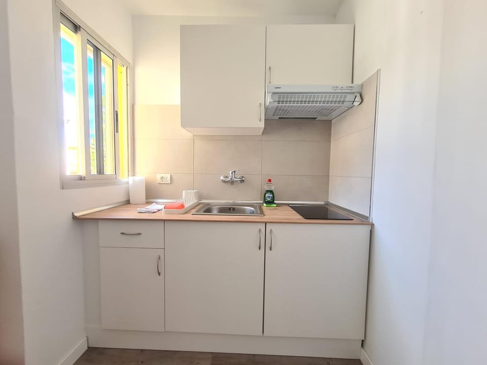 Kitchen or kitchenette, stove