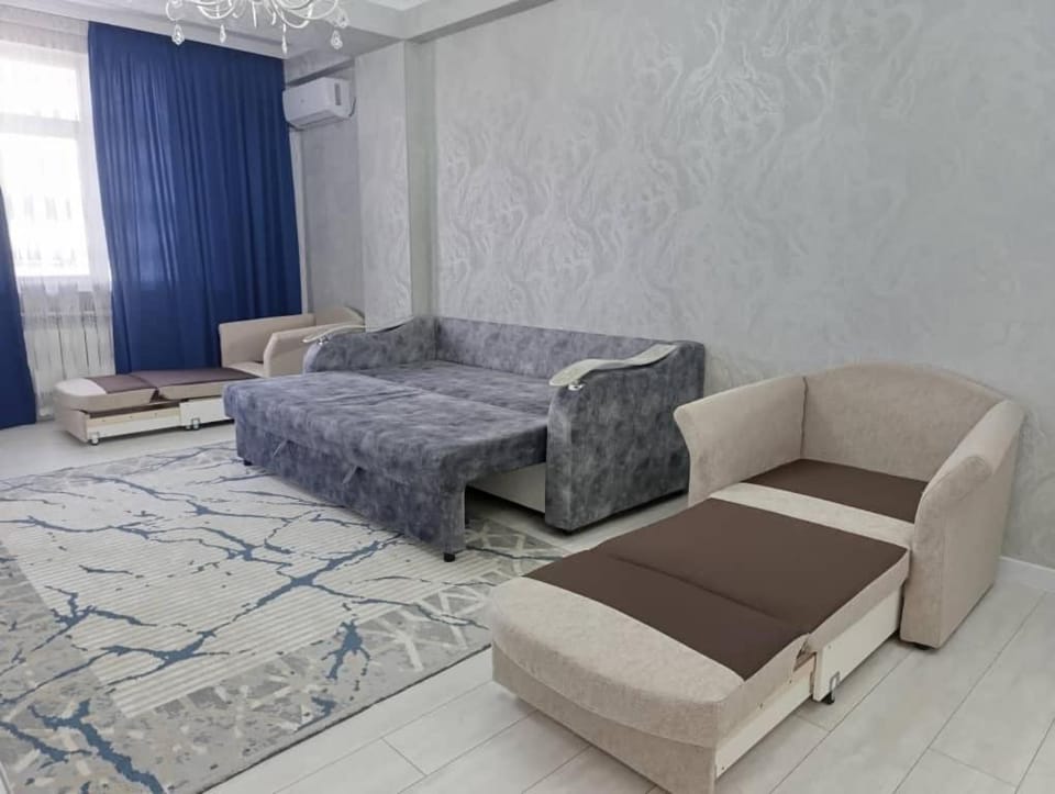 Bed, Living room, Seating area, Bedroom
