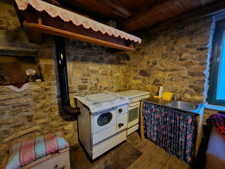 Kitchen or kitchenette, stove