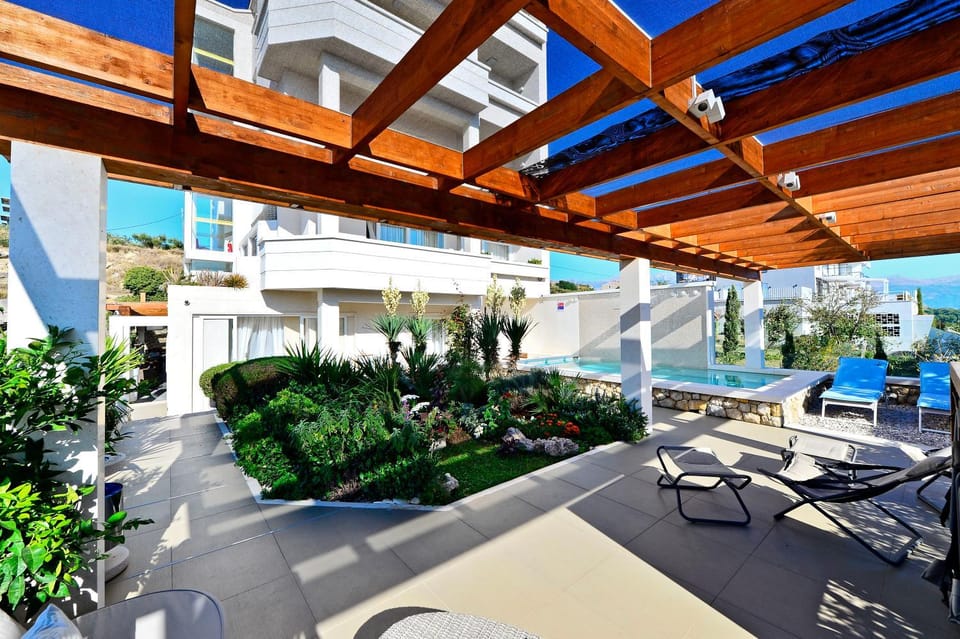Property building, Patio, Day, Garden, Garden, View (from property/room), Balcony/Terrace, Garden view, Pool view, Swimming pool, Swimming pool, sunbed