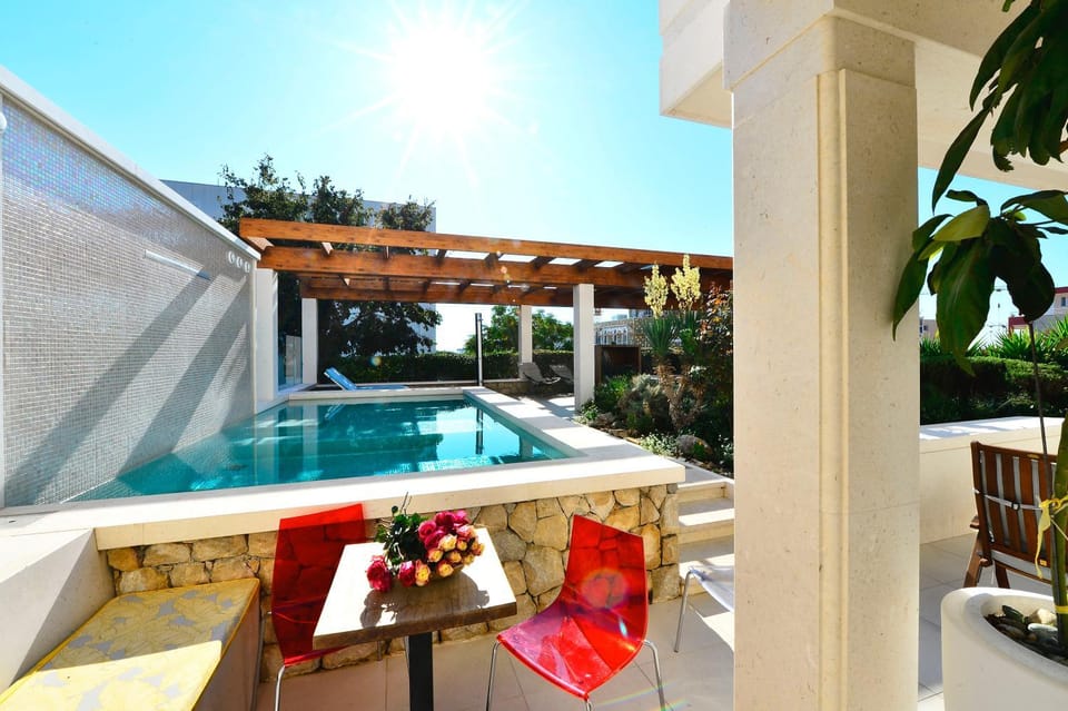 Property building, Patio, Day, Garden, View (from property/room), Balcony/Terrace, Garden view, Pool view, Swimming pool, sunbed