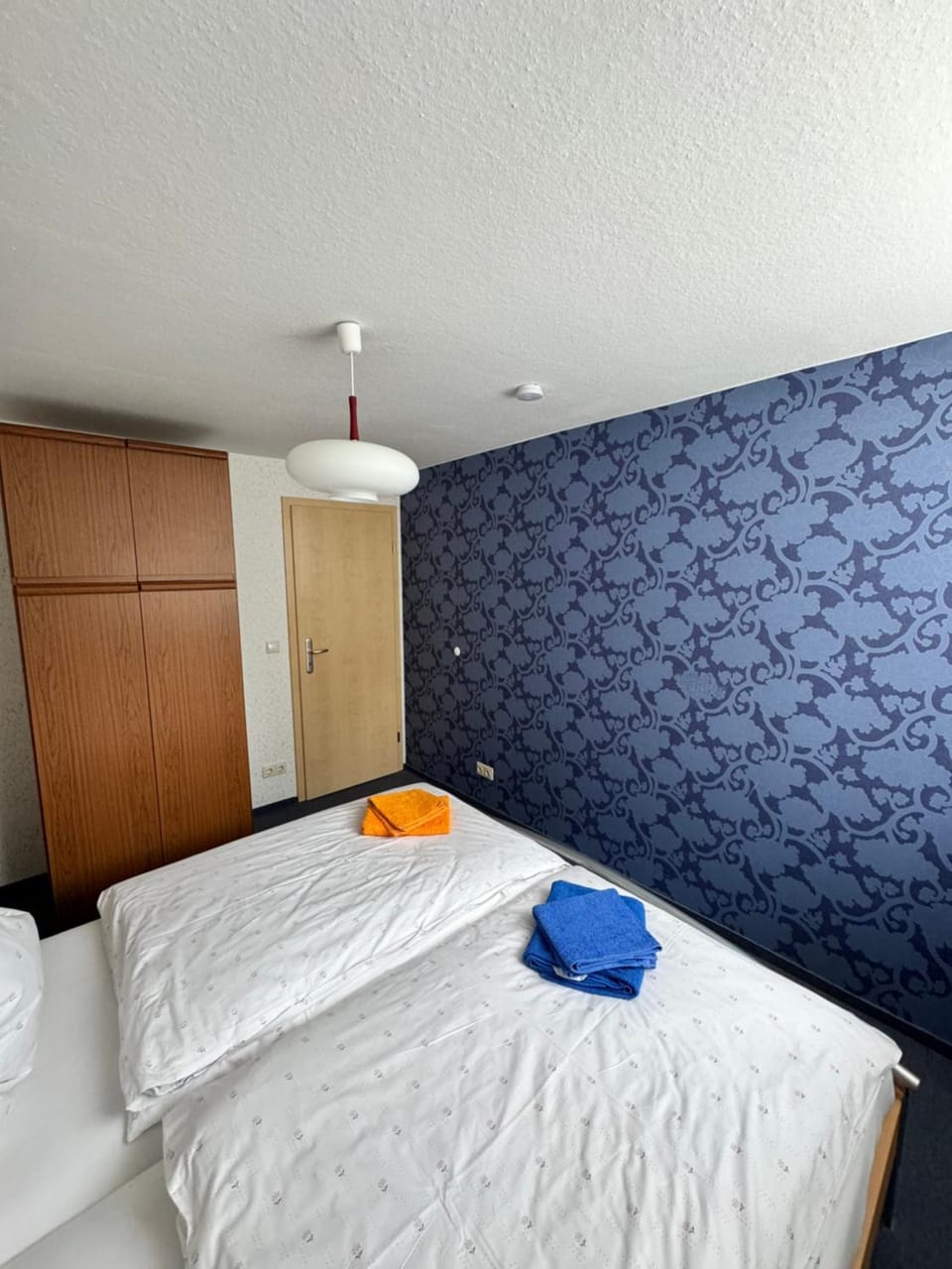 Bed, Photo of the whole room, Bedroom, towels, wardrobe