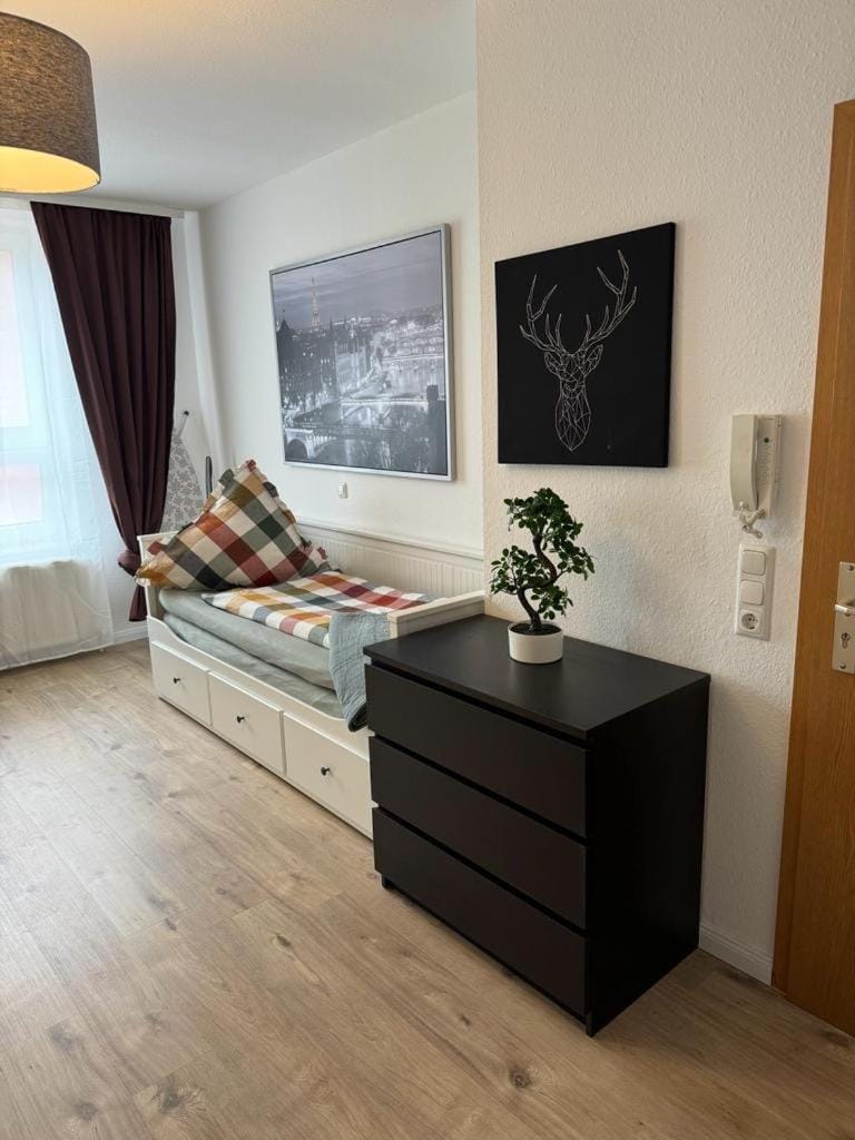 Bed, Living room, Seating area, Bedroom