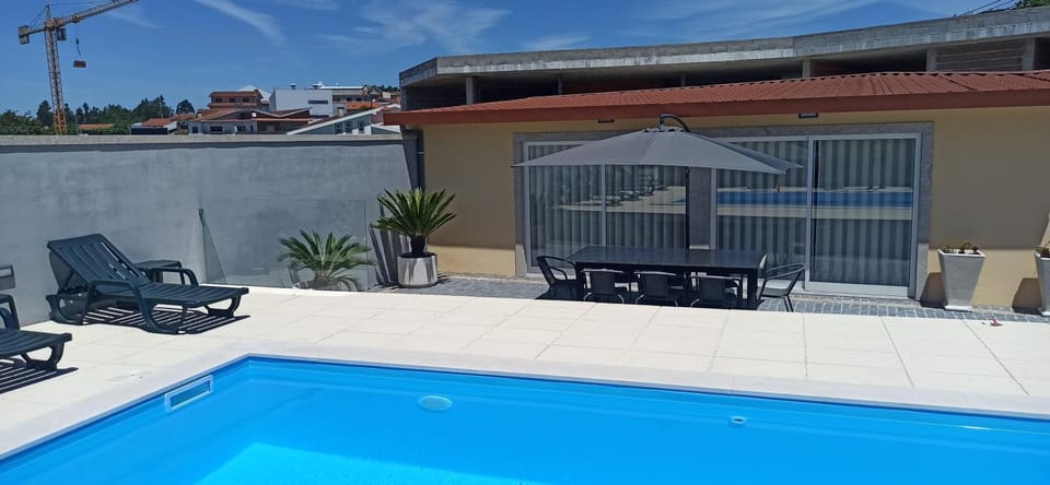 Property building, Patio, Balcony/Terrace, Swimming pool, sunbed