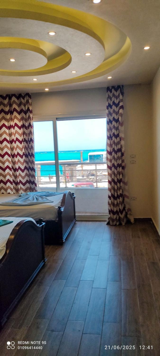 Bed, Natural landscape, View (from property/room), Balcony/Terrace, Living room, Photo of the whole room, Seating area, Bedroom, Sea view