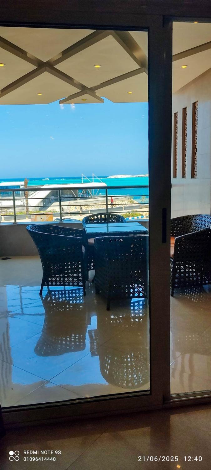 Natural landscape, View (from property/room), Balcony/Terrace, Living room, Seating area, Dining area, Sea view