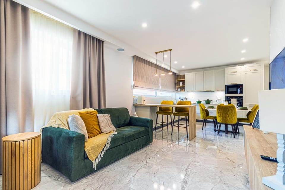 TV and multimedia, Living room, Seating area, Dining area, stove, kitchen, air conditioner, air conditioner