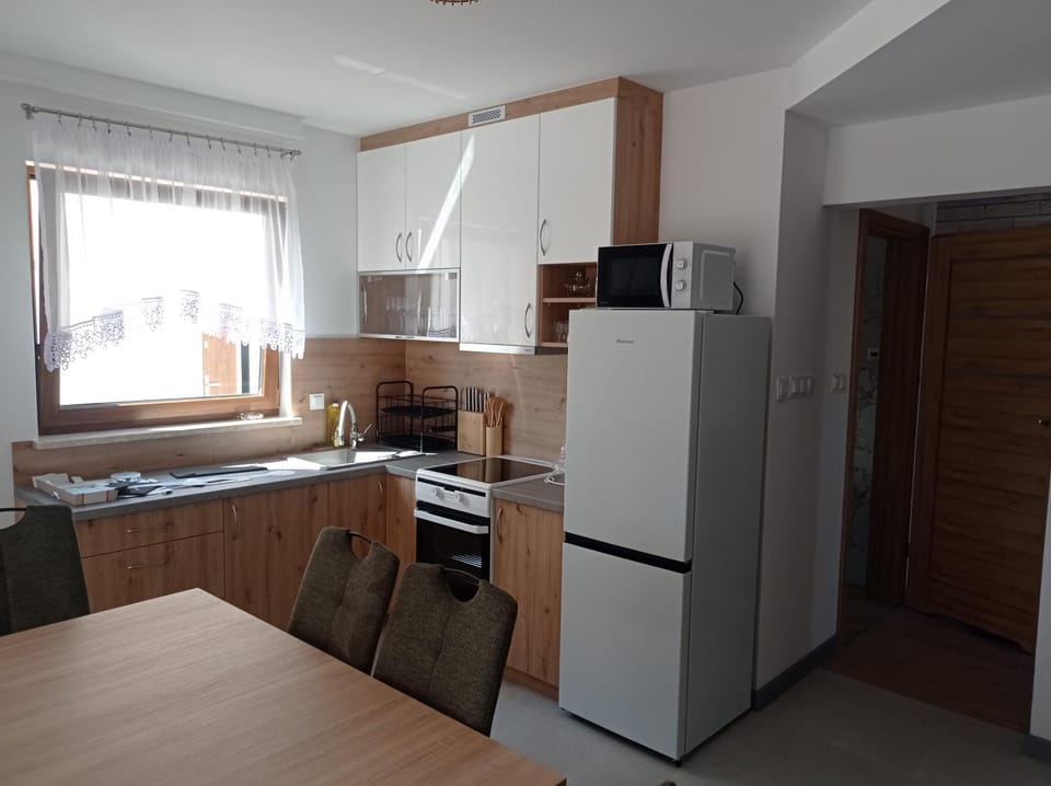 Domki u Eweli CAŁOROCZNE ogrzewane kominkiem House in Pomeranian Voivodeship