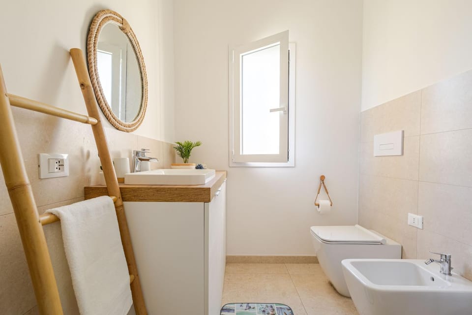 Shower, Toilet, Bathroom, bidet, towels, washing machine