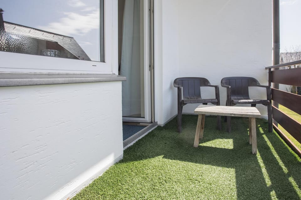 Welcome in - Appartement 'Sahneblick' met balkon en berging, dichtbij de skipistes Apartment in Winterberg