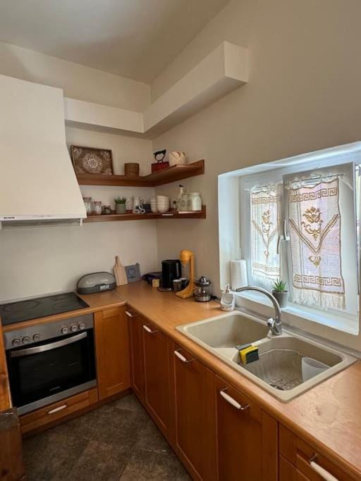 Kitchen or kitchenette, oven, stove