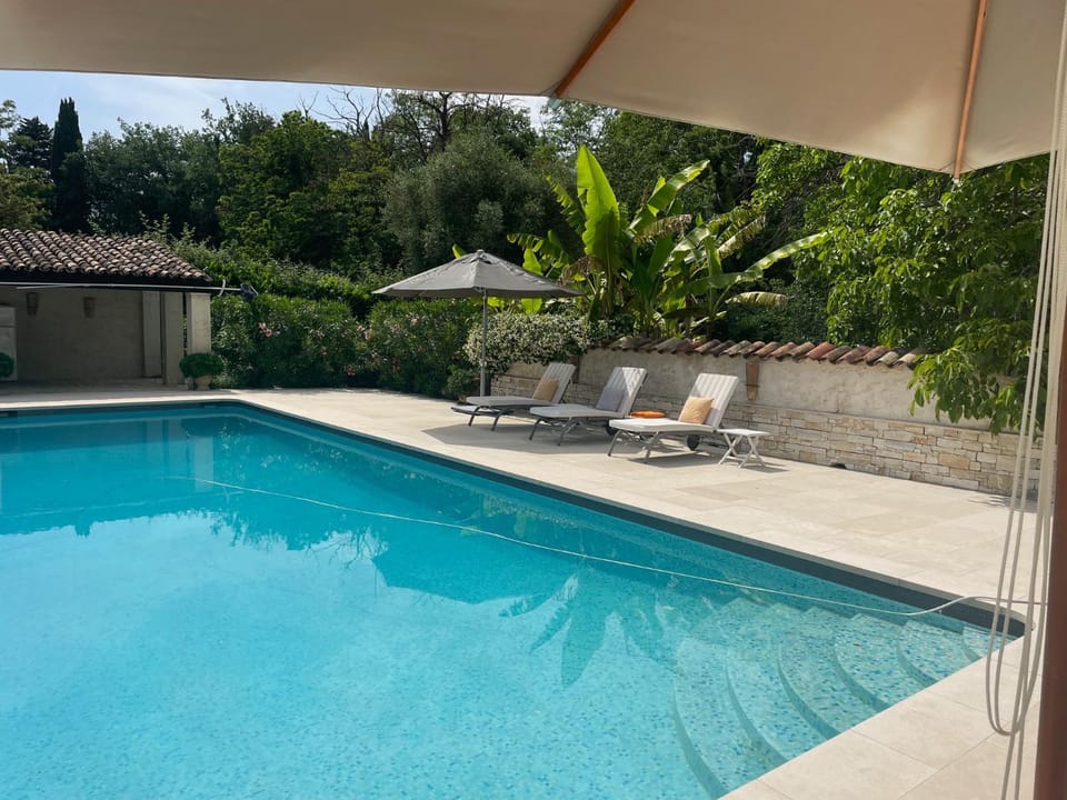 Swimming pool, sunbed