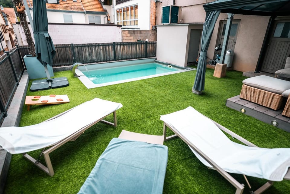 Property building, Living room, Swimming pool