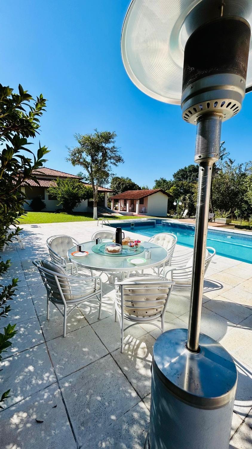 Patio, Living room, Seating area, Dining area, Pool view, Swimming pool