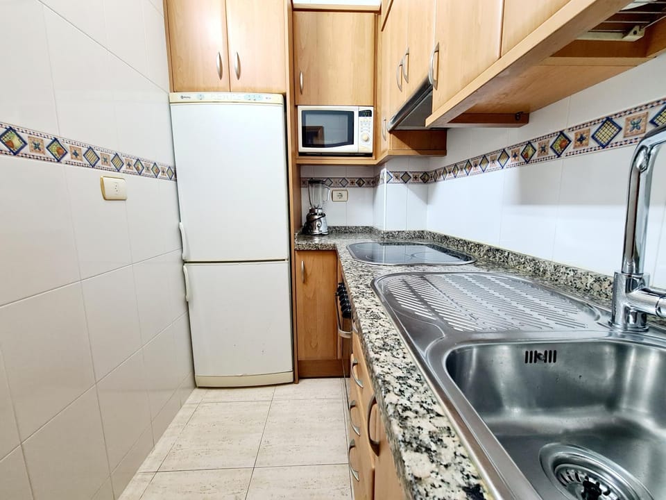 Kitchen or kitchenette, oven, stove