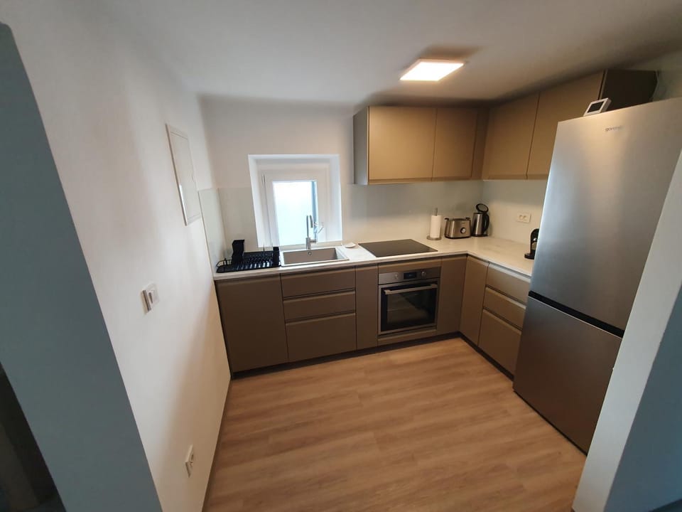 Kitchen or kitchenette, oven, stove