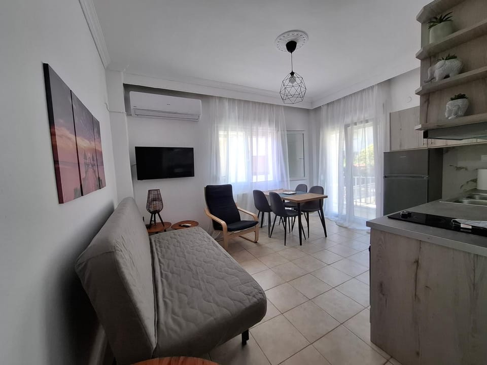 TV and multimedia, Kitchen or kitchenette, Living room, Seating area, Bedroom