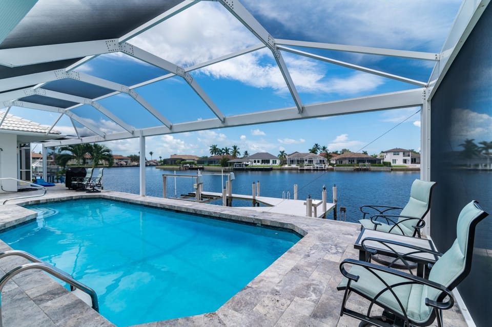 A Returning Waterfront Favorite I Wide Water Views House in Marco Island