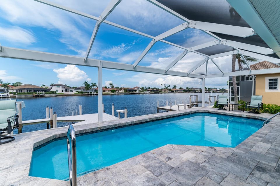 A Returning Waterfront Favorite I Wide Water Views House in Marco Island