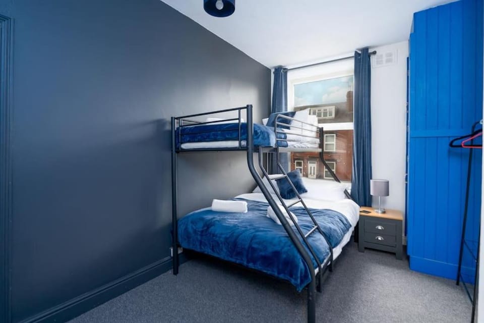 Photo of the whole room, bunk bed, wardrobe