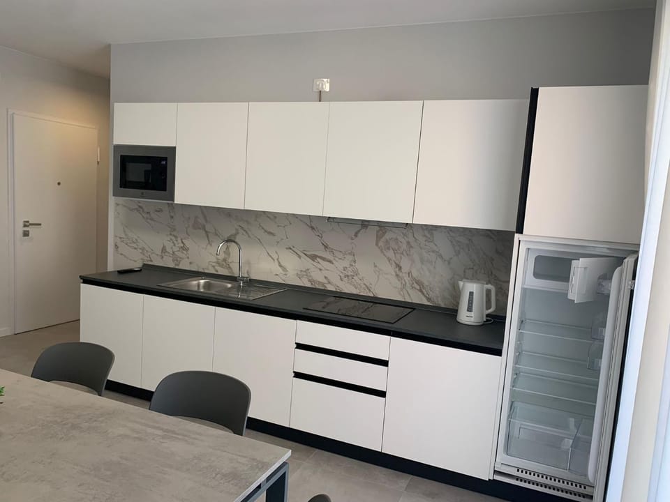 Living room, microwave, kitchen